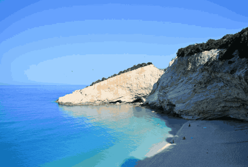 Plaža Lefkade Porto Kaciki — ikonske bele litice i polumesec šljunka